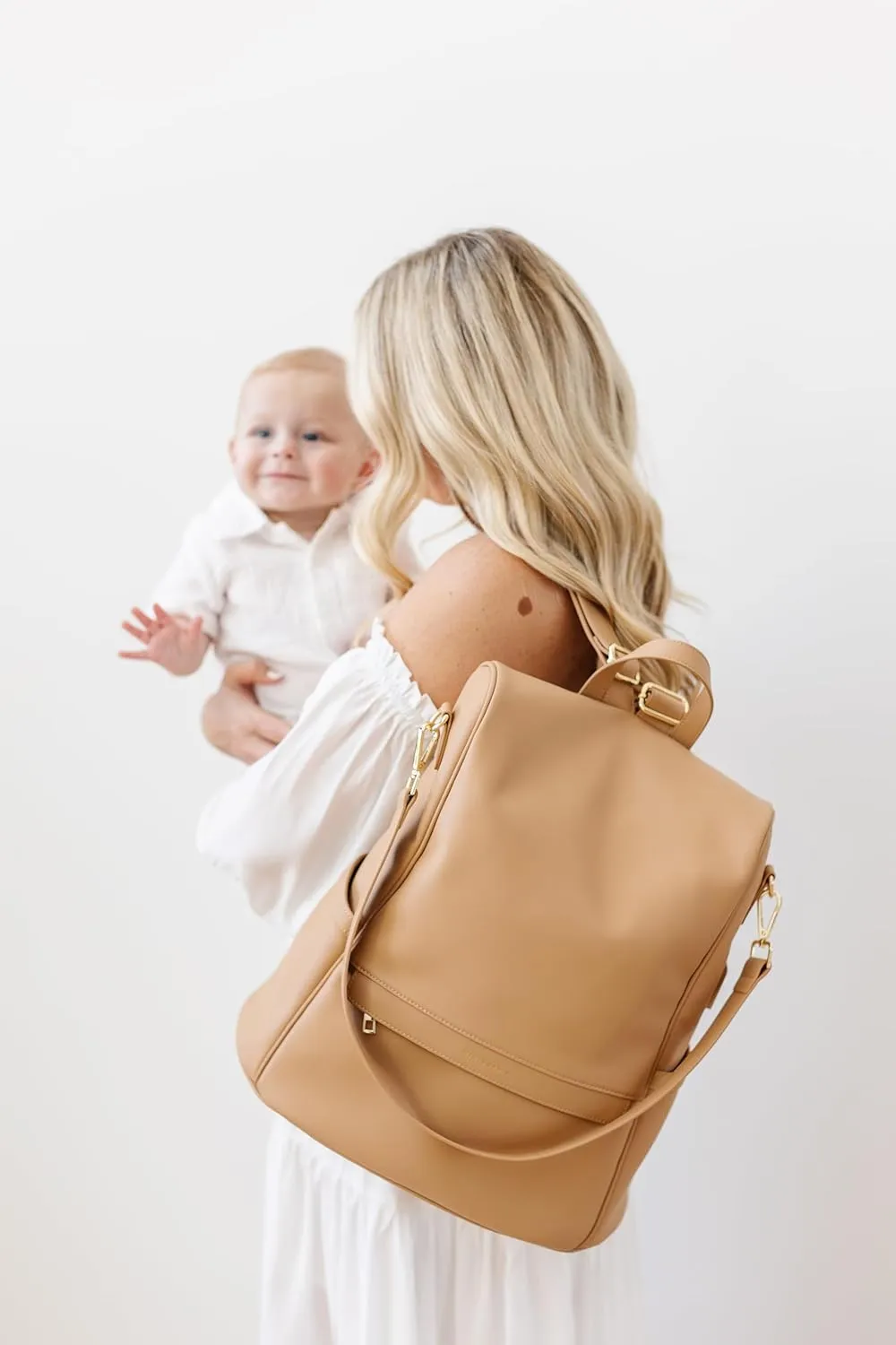 Leather Diaper Bag Backpack with USB Charging port, Changing Pad, Stroller Straps, and Bottle Holder (Brown Mia)